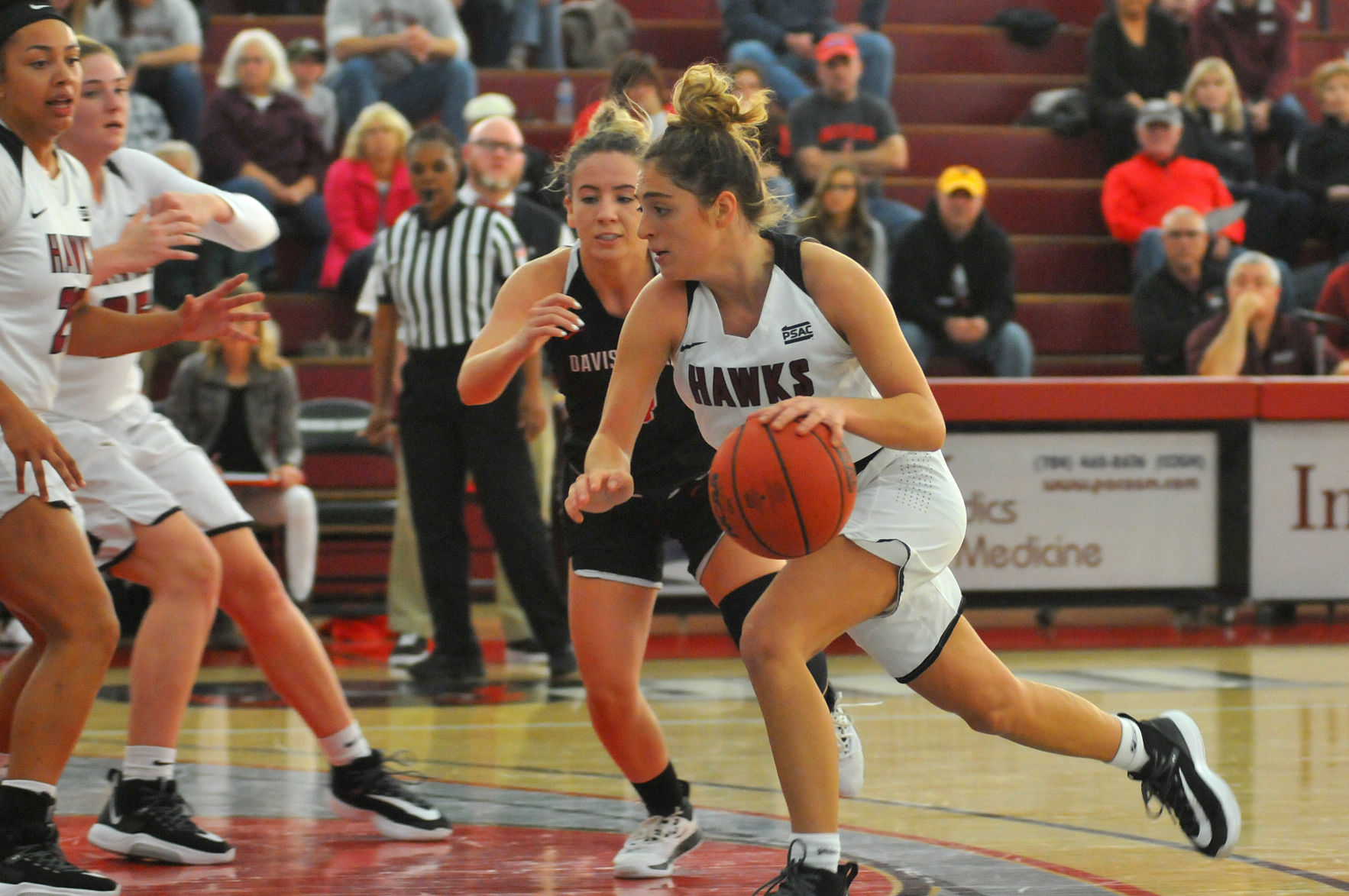 Gazette Photo Gallery: Hawks women dominate in season opener